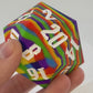 The Rainbow Swirl – 55mm Silicone D20 Dice
